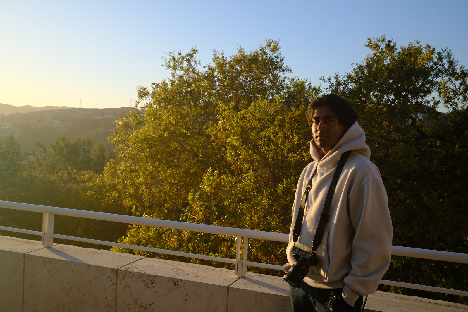 Man in front of hills